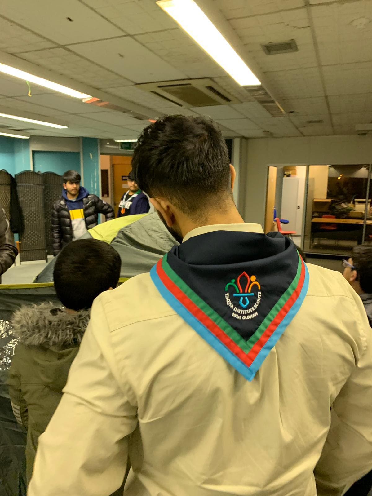Scouts gathered for a briefing in uniform